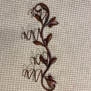 Wrought iron wine bottle wall holder/ wine rack